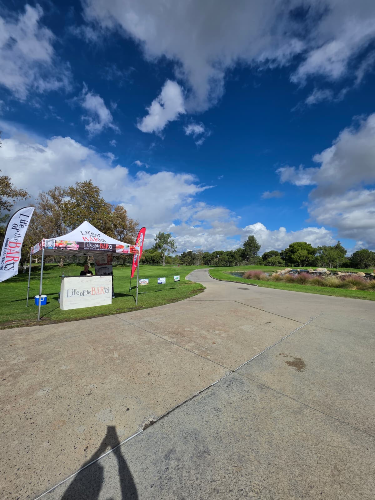Outdoor path and event tent near the ABAIE gathering