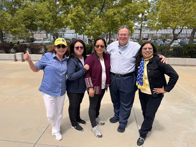 Five attendees together outdoors at Rotary District 5330 training