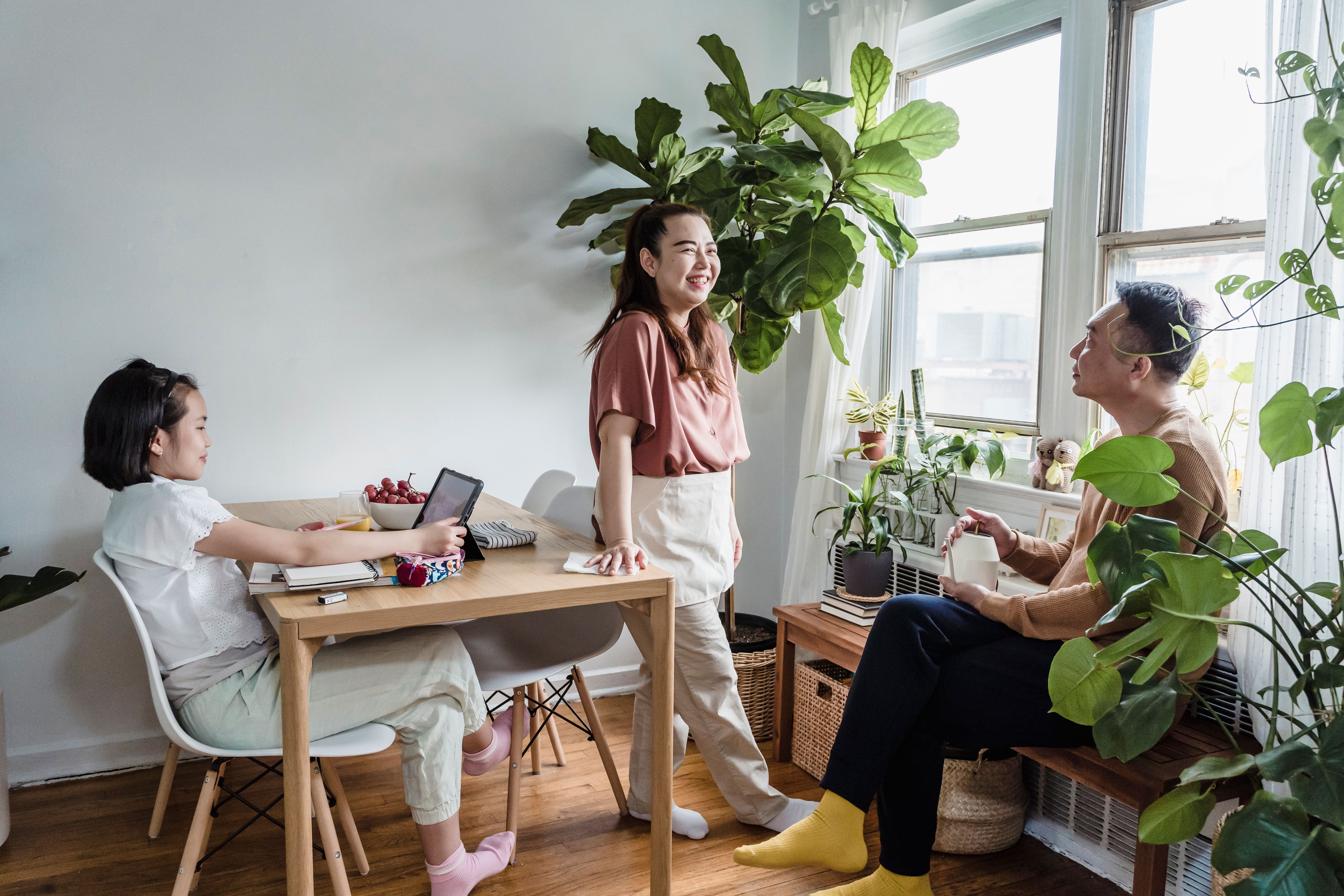 Illustrative family together at home